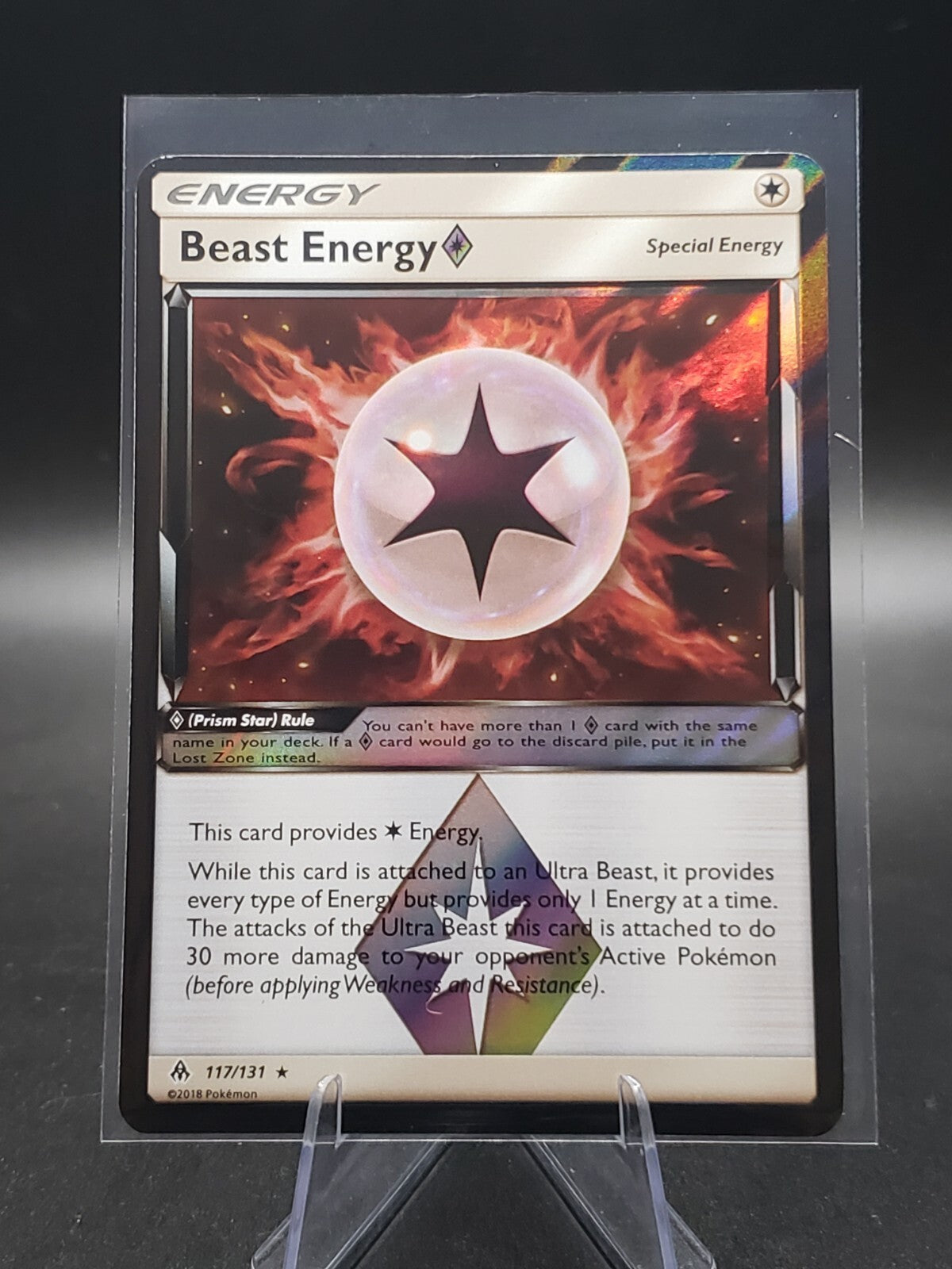 Pokemon - Forbidden Light - Beast Energy - 117/131 Holo Prism Star NM